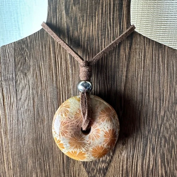 Light Yellow Coral Fossil Donut Pendant Necklace on Brown Faux Suede - Picture 9 of 11